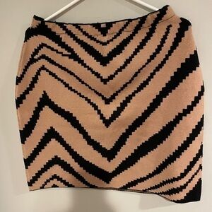 This brown and black sweater material skirt is a large (not marked).